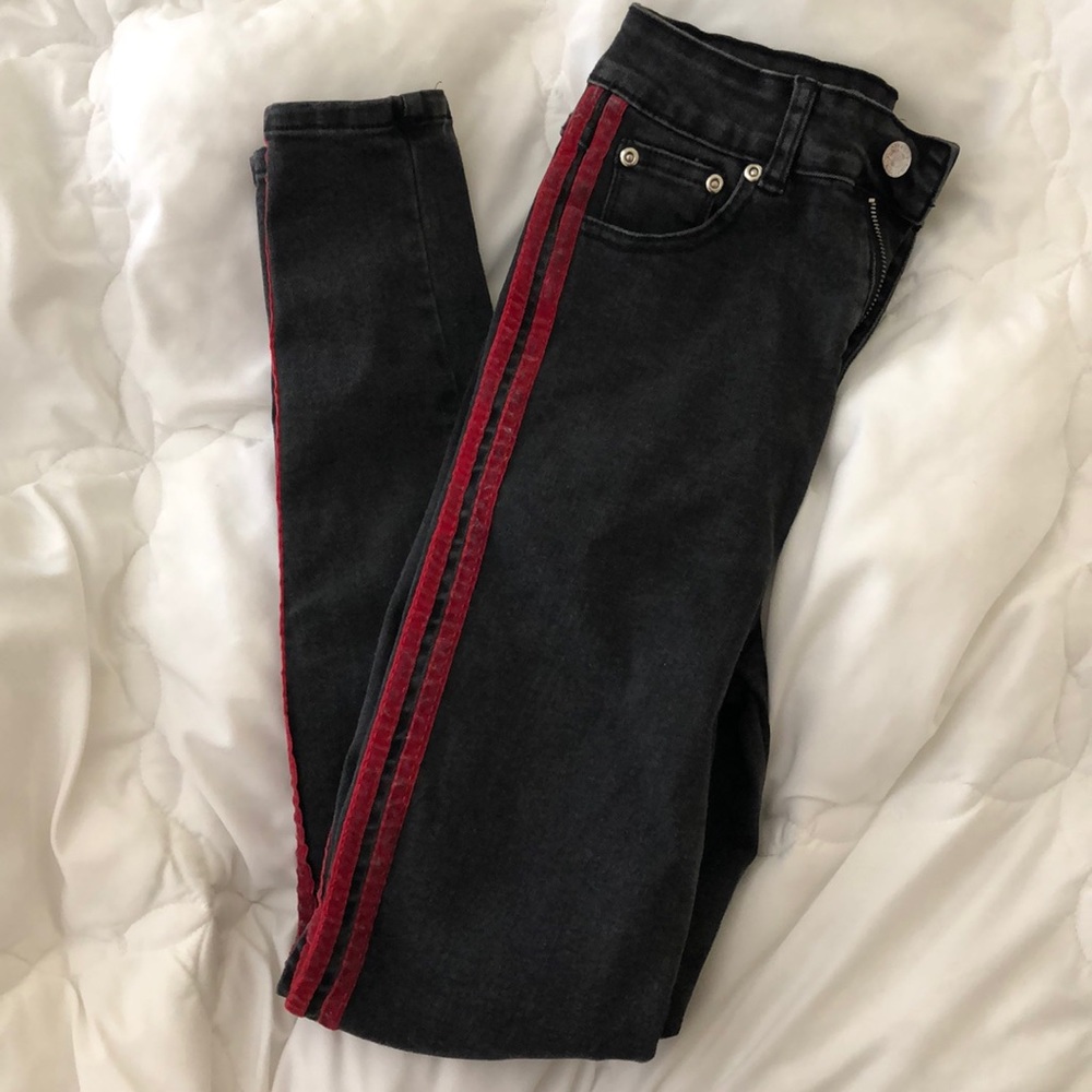 black skinny jeans with red stripe